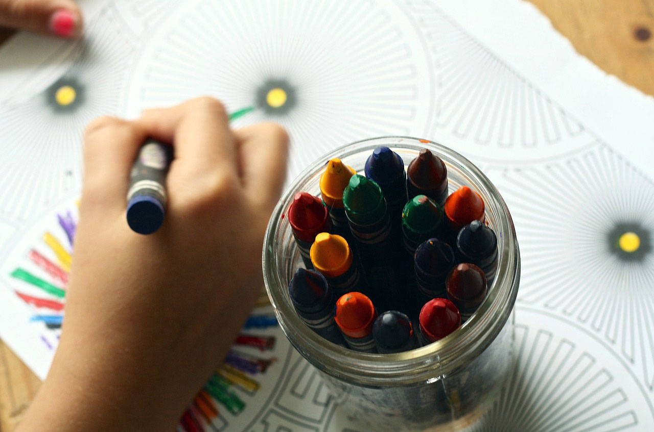 kids playing with crayons on canvas prints